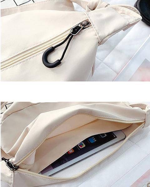 Korean style dark black solid color canvas bag women's 2021 new Korean version simple student One Shoulder Messenger Bag Korean style dark black solid color canvas bag women's 2021 new Korean version simple student One Shoulder Messenger Bag